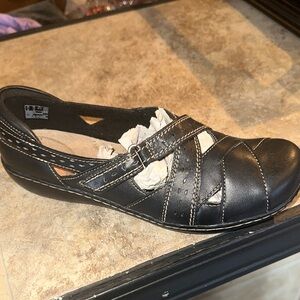 Clarks Black Leather Flats with Cutout Design